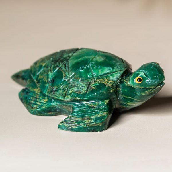 Side view of handcrafted semi precious stone turtle sculpture