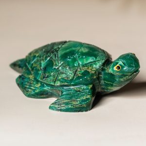 Side view of handcrafted semi precious stone turtle sculpture