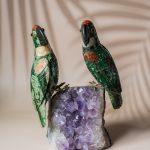 Luxury green aventurine parrot pair handcrafted on natural amethyst geode for premium home decor and gifting