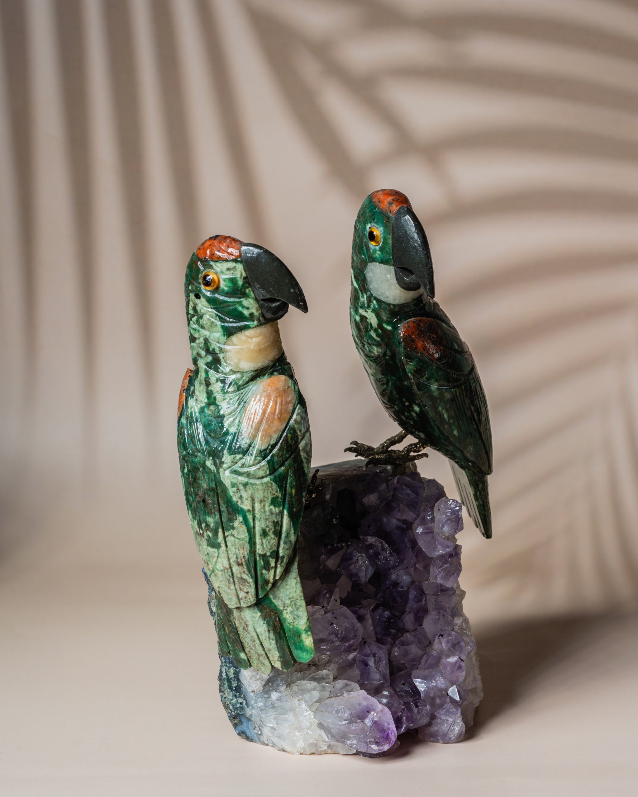 Luxury green aventurine parrot pair handcrafted on natural amethyst geode for premium home decor and gifting