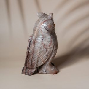 Detailed carving of grey agate owl gemstone decor piece