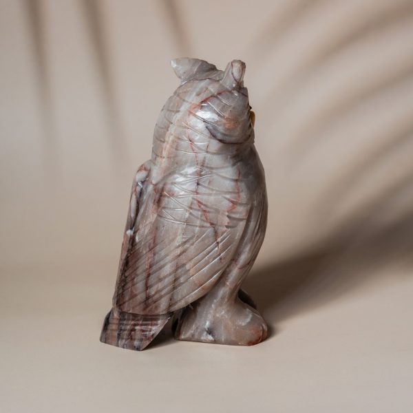 Detailed carving of grey agate owl gemstone decor piece