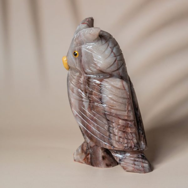 Detailed carving of grey agate owl gemstone decor piece