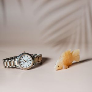 Honey calcite fish figurine made from semi-precious stone for home decor and gifting