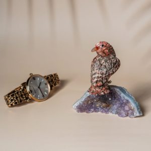 Leopard jasper sparrow figurine perched on natural amethyst geode base