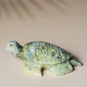 Handcrafted light green jade turtle sculpture made from natural semi-precious stone
