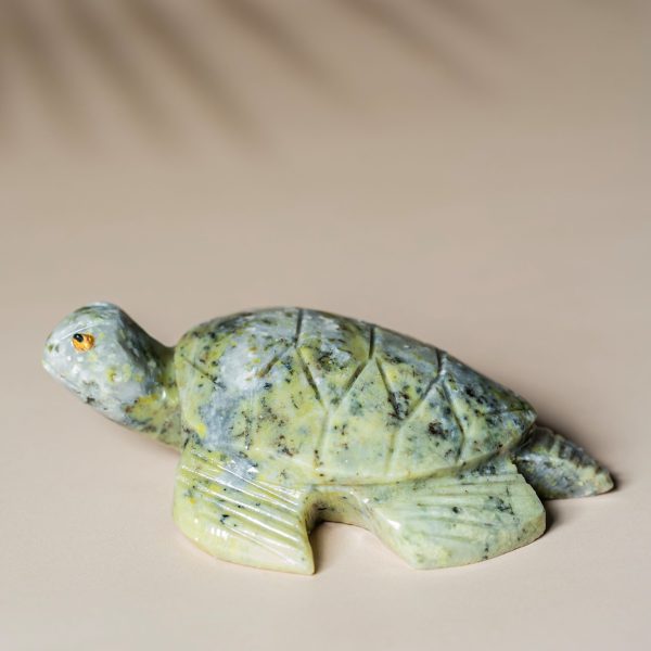 Handcrafted light green jade turtle sculpture made from natural semi-precious stone