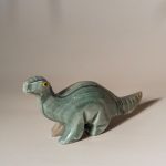 Hand-carved onyx stone dinosaur figurine