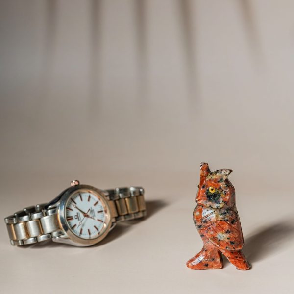 Orange calcite owl figurine made from semi-precious stone for home decor and gifting