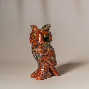 Orange calcite owl figurine made from semi-precious stone for home decor and gifting.