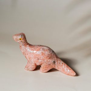 Handcrafted pink granite dinosaur figurine made from semi precious stone
