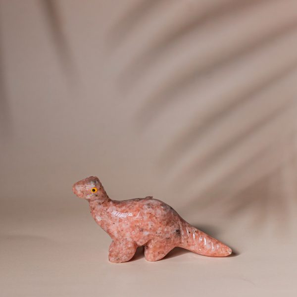 Handcrafted pink granite dinosaur figurine made from semi precious stone