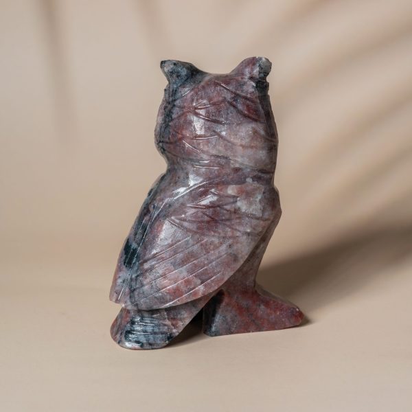 Back view of handcrafted purple jasper owl stone sculpture