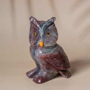 Handcrafted purple jasper owl sculpture with natural stone patterns