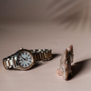 Hand-carved rose calcite fish figurine showcasing soft pink stone tones for home decor