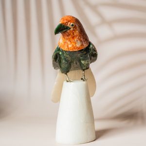 Semi precious stone parrot sculpture with orange calcite head and green aventurine body