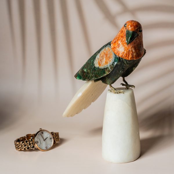 Semi precious stone parrot sculpture with orange calcite head and green aventurine body