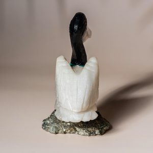 White onyx pelican figurine handcrafted from semi precious stone on natural pyrite base