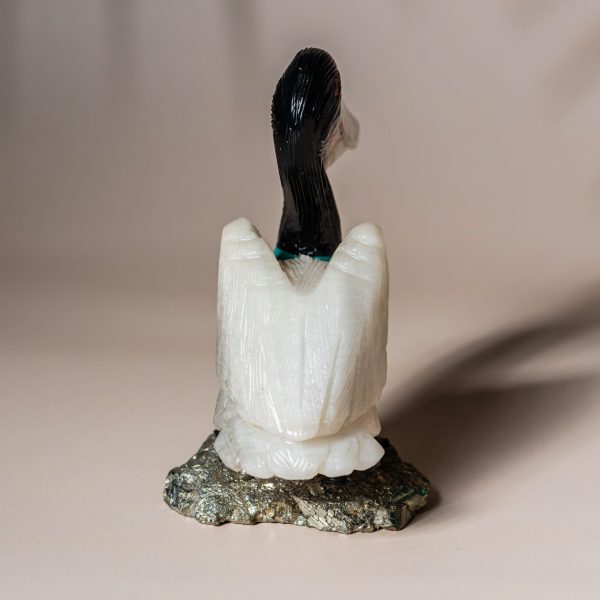 White onyx pelican figurine handcrafted from semi precious stone on natural pyrite base