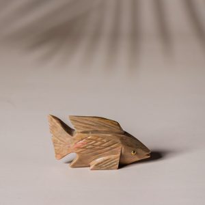 Yellow brown calcite fish figurine made from semi-precious stone for home decor and gifting