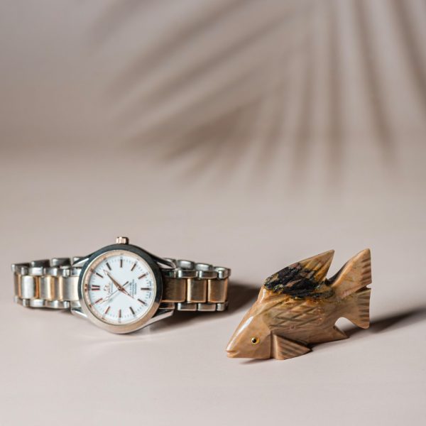 Yellow brown calcite fish figurine made from semi-precious stone for home decor and gifting